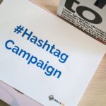 A concept image of a hashtag campaign displayed on paper for marketing strategies.